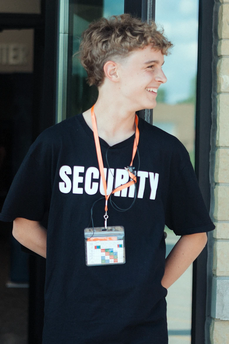 Group of girls sitting on grass smiling