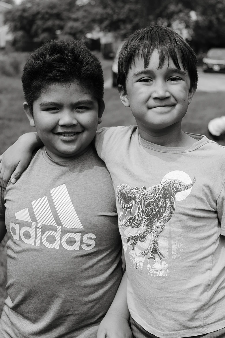 Group of girls sitting on grass smiling
