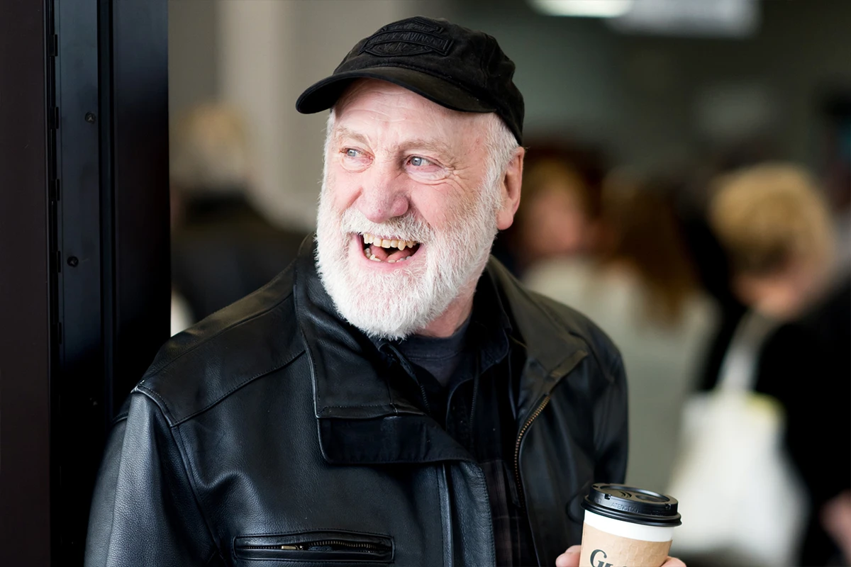 Women helping children at a registration table. Women helping children at a registration table.